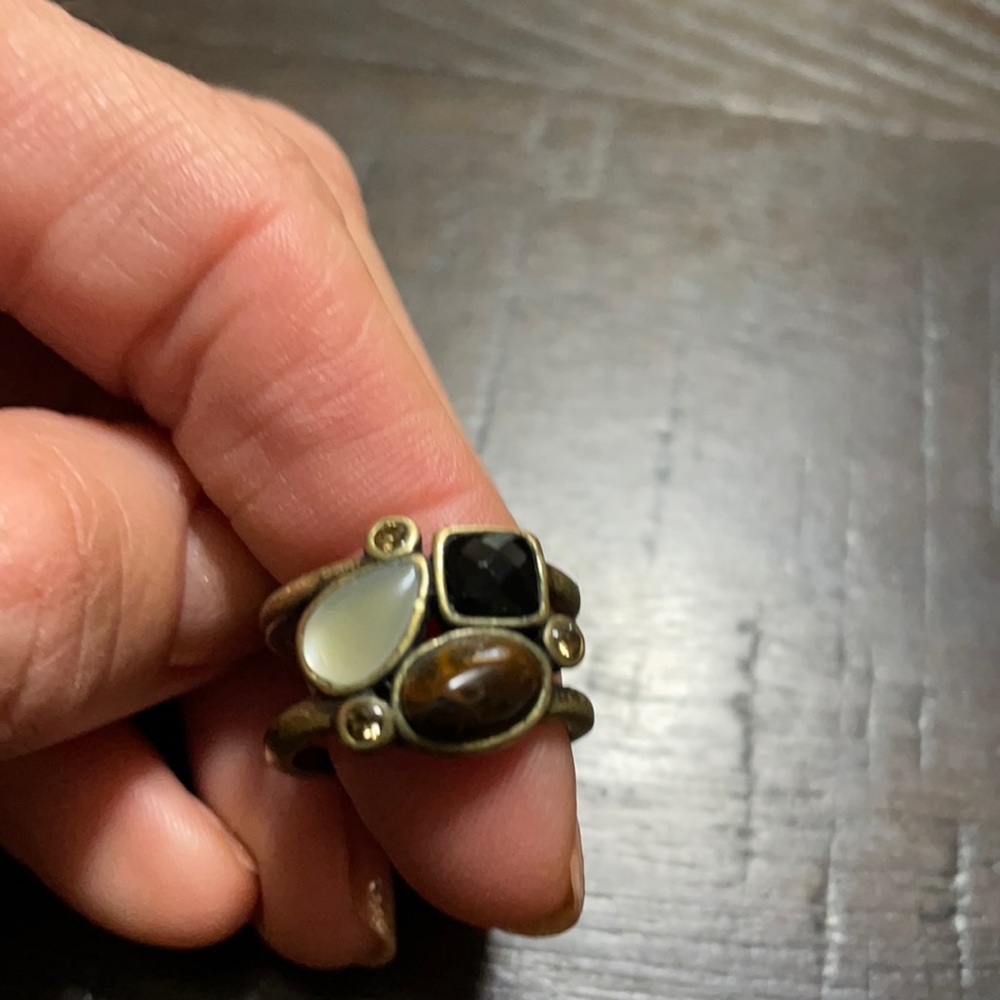 Lia Sophie Size 7 gold tone ring with stones.